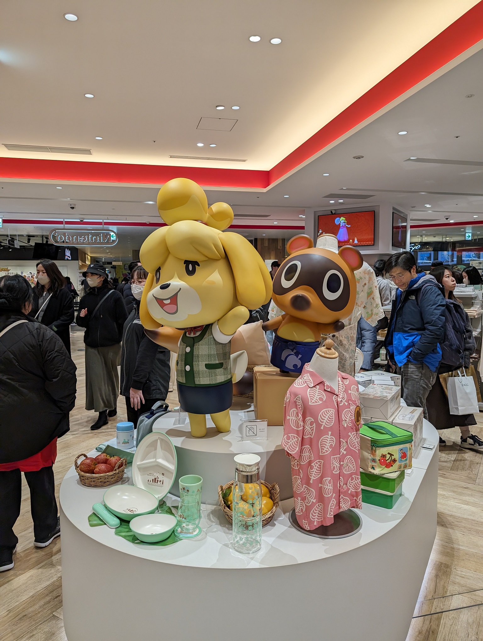 Isabelle and one of Tom Nook’s nephews at Nintendo Tokyo